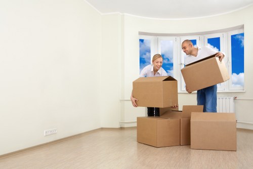 Organised self-storage space in Brentford with stacked boxes