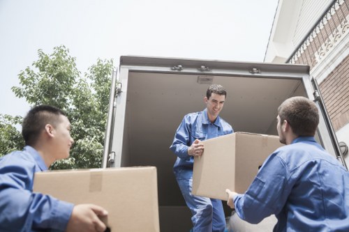 Brentford man and van loading furniture into a moving van