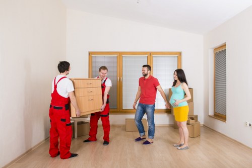 Brentford Removals team reviewing health and safety procedures