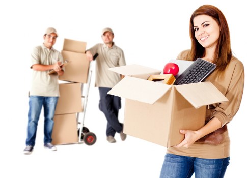 Moving van and packed boxes in Brentford