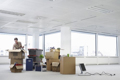 Professional packing materials and office equipment prepared for a Brentford business move