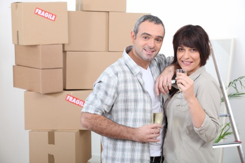 Professional movers handling furniture during a Brentford house relocation