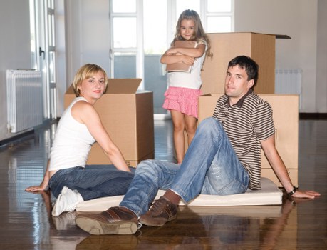 Packing fragile household items for house removals in Brentford